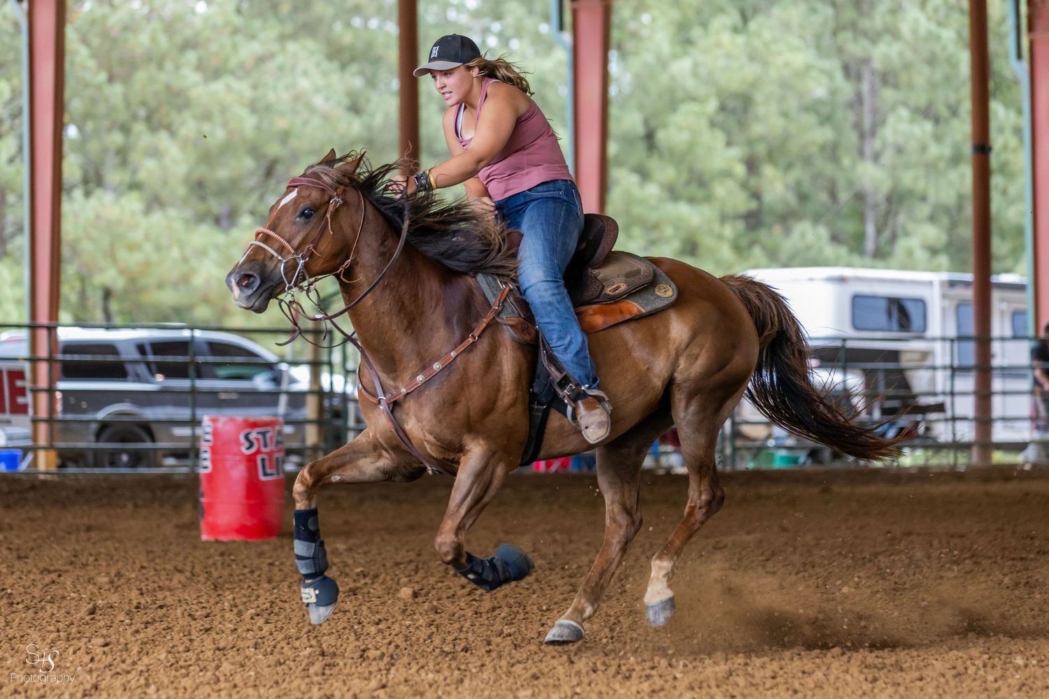 Girl on horse barrel racing