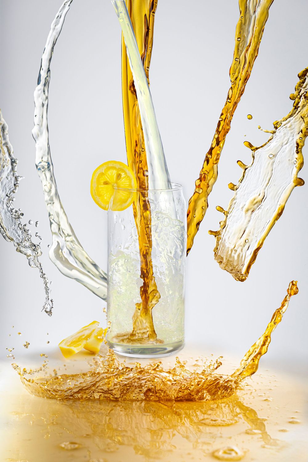Tabletop creative splash Arnold palmer drink photography.