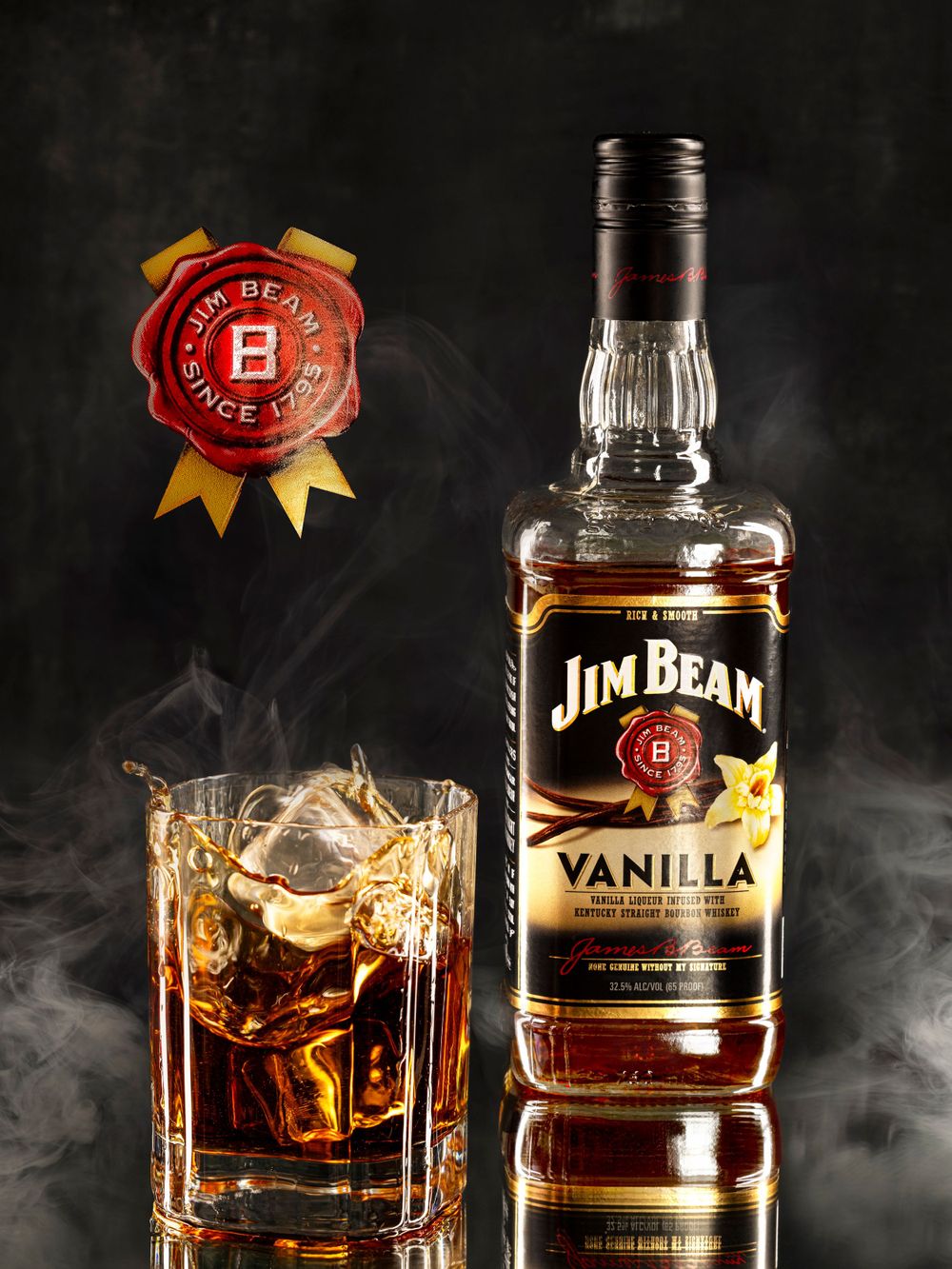 Jim beam alcohol photographed with smoke and ice cube splashing into cup