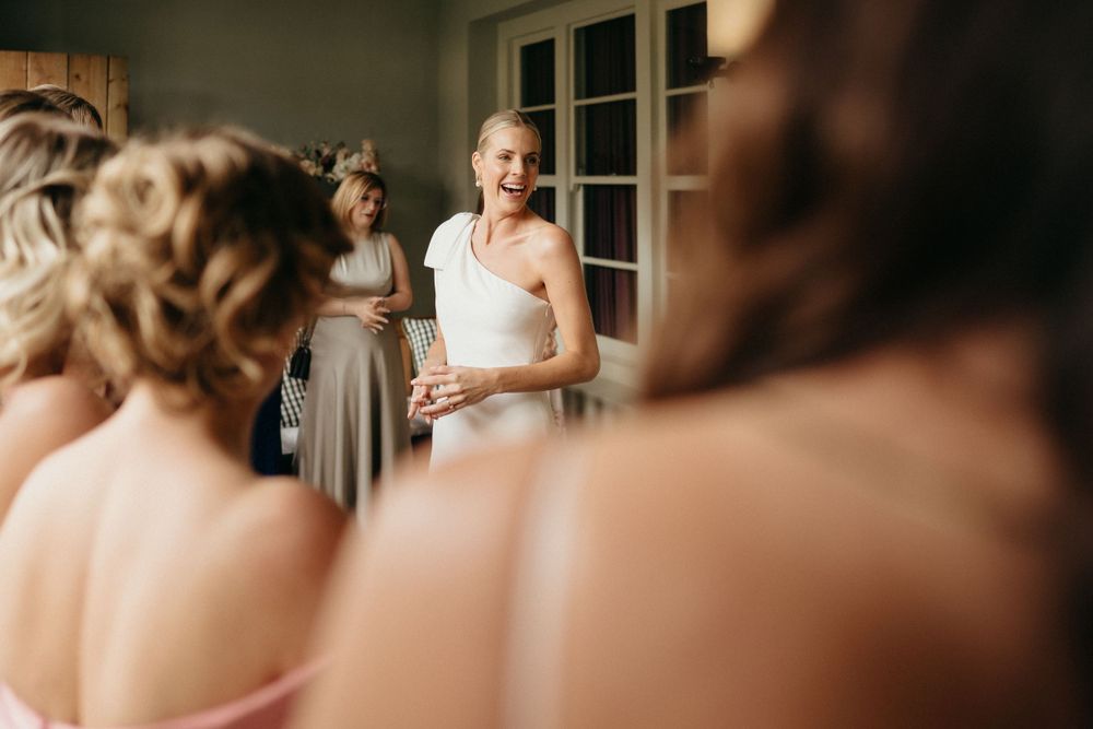 An intimate pre-wedding moment captured in soft lighting.