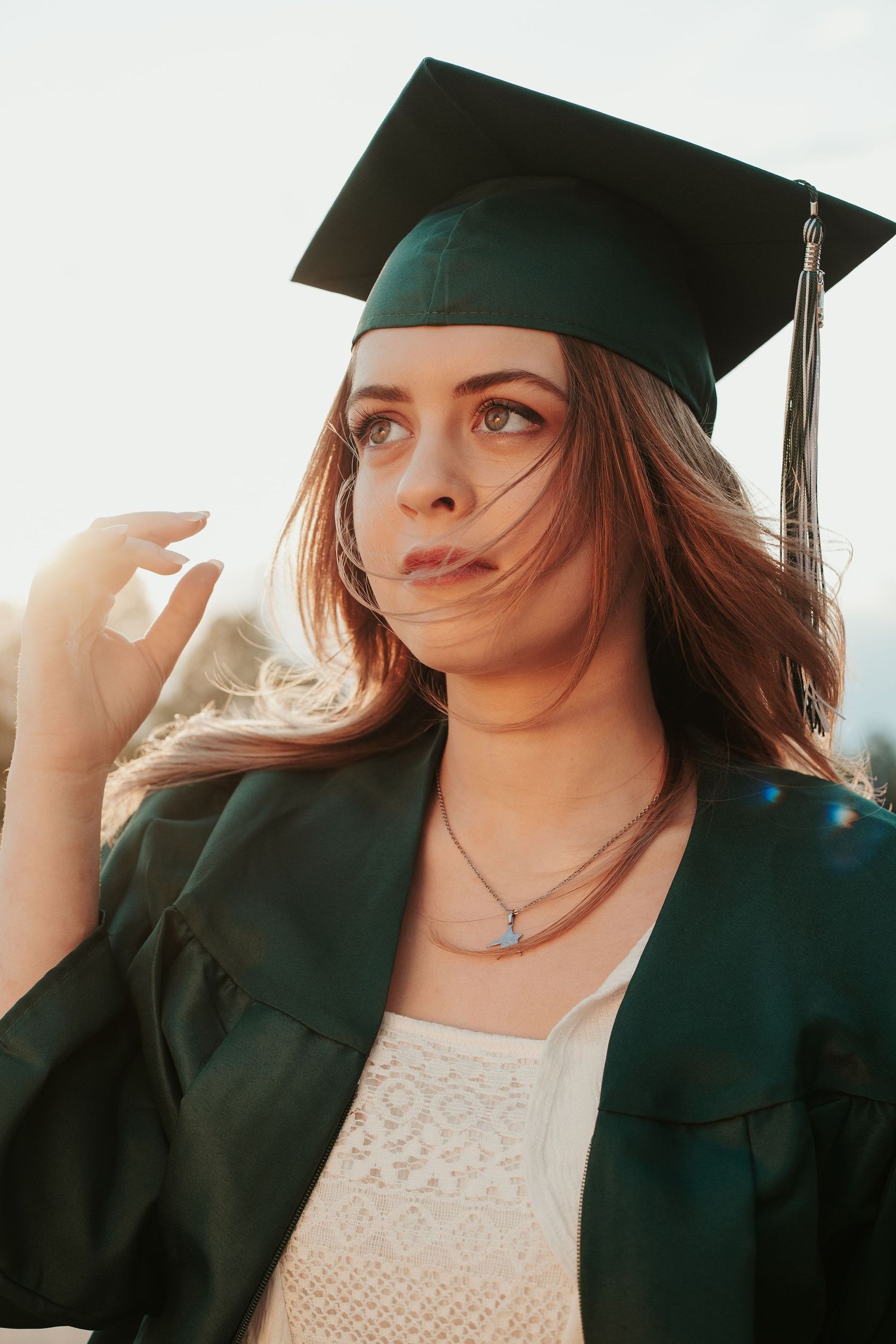 senior photo with cap and gown