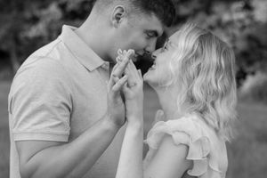 Black and white series of intimate moments between a couple in an outdoor setting.