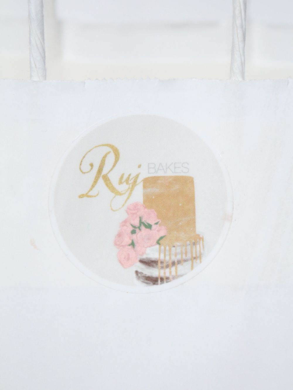Elegant wedding cake design stickers in gold and pink tones with floral accents.