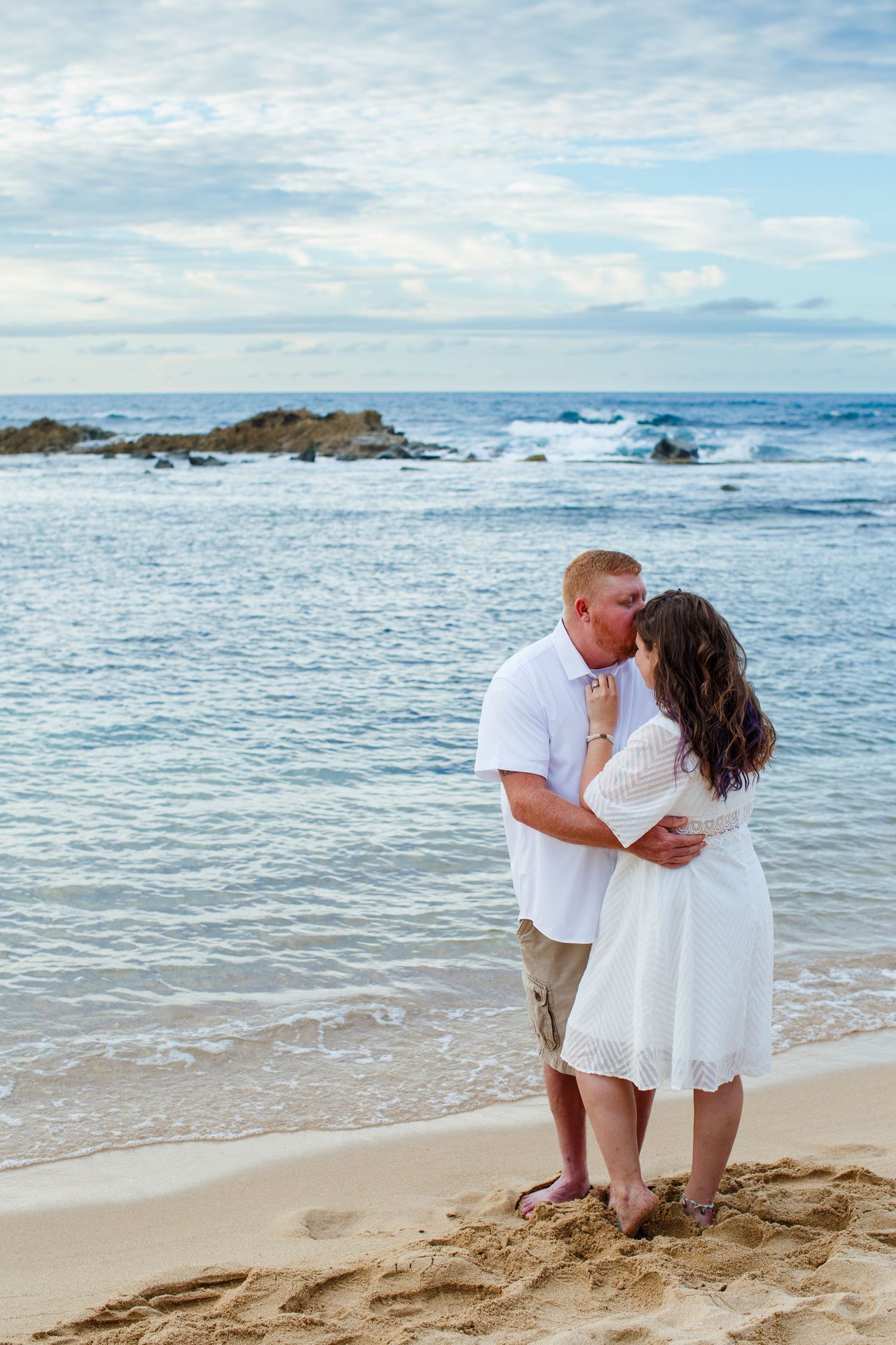 Elopement on the beach at Balneario del Escambrón in Old San Juan, Puerto Rico. Couples portrait - bride and groom.