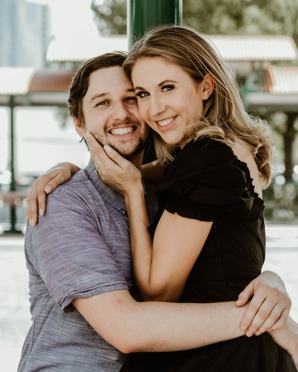A loving couple shares four sweet moments of embracing and smiling together in matching casual outfits.