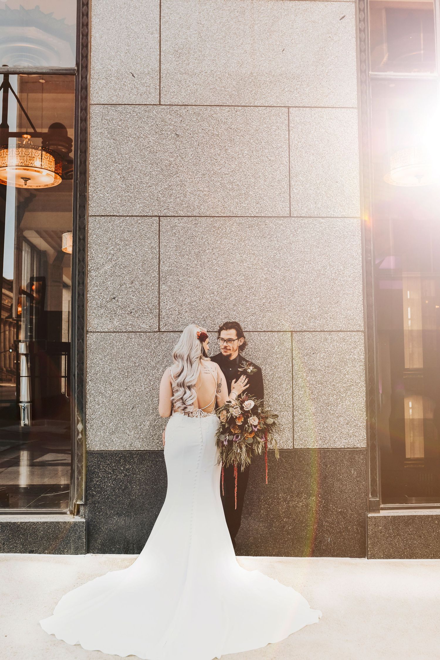the carlisle room makes the most modern backdrop for this bride and groom