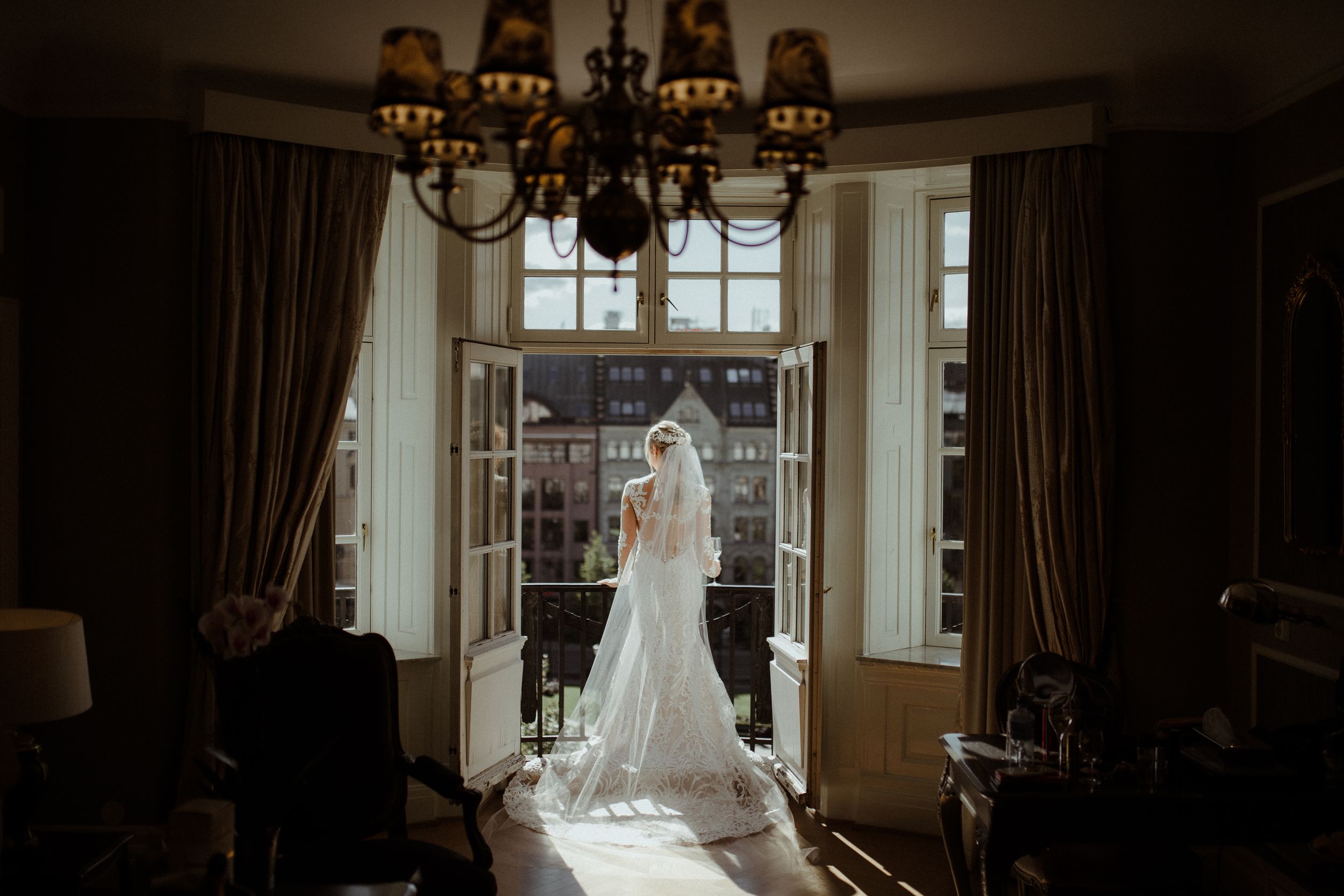 Elegant classic interior of a wedding venue with natural light streaming through windows.