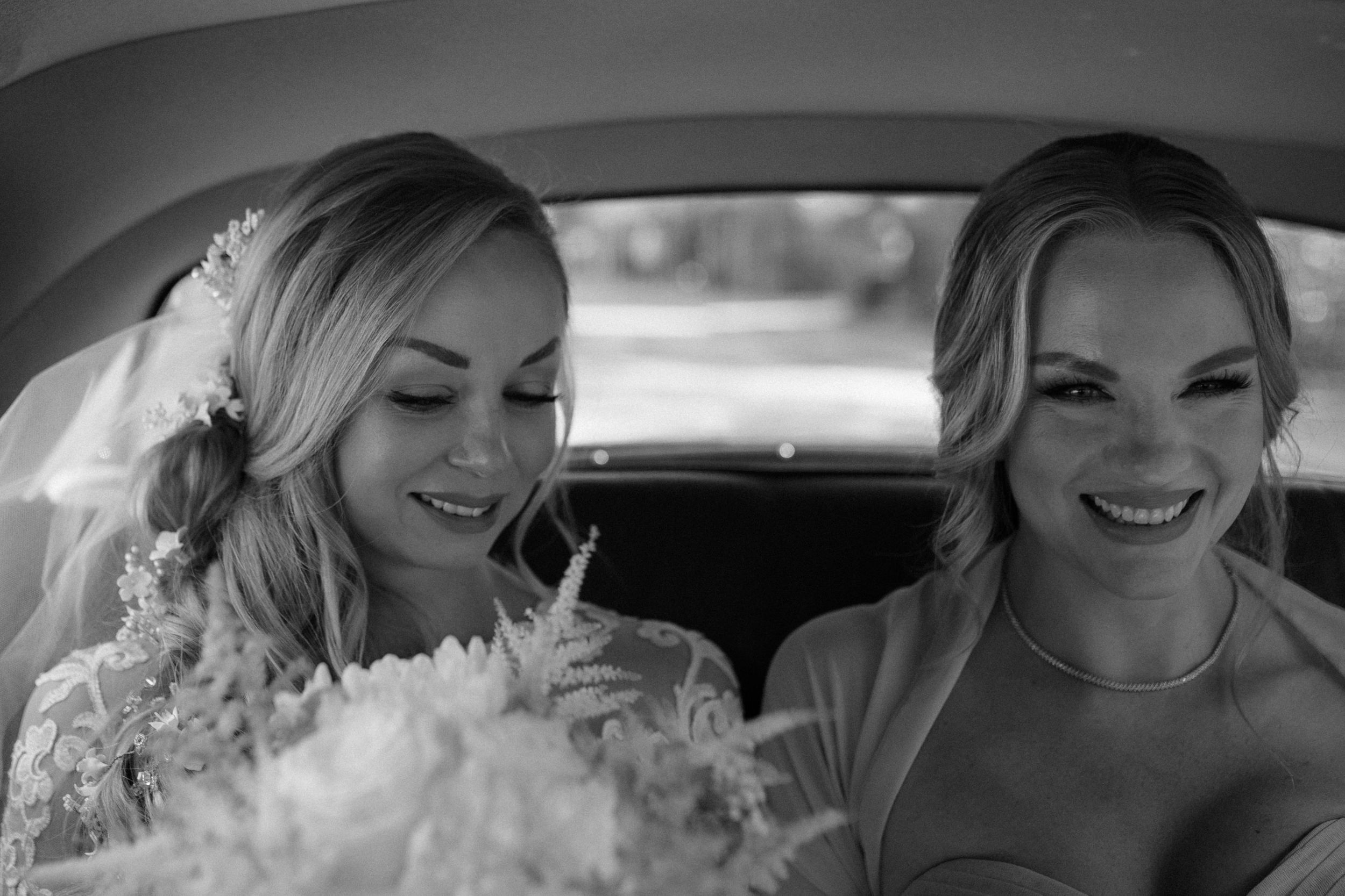 Black and white candid shots capture joyful laughter and moments shared in car.