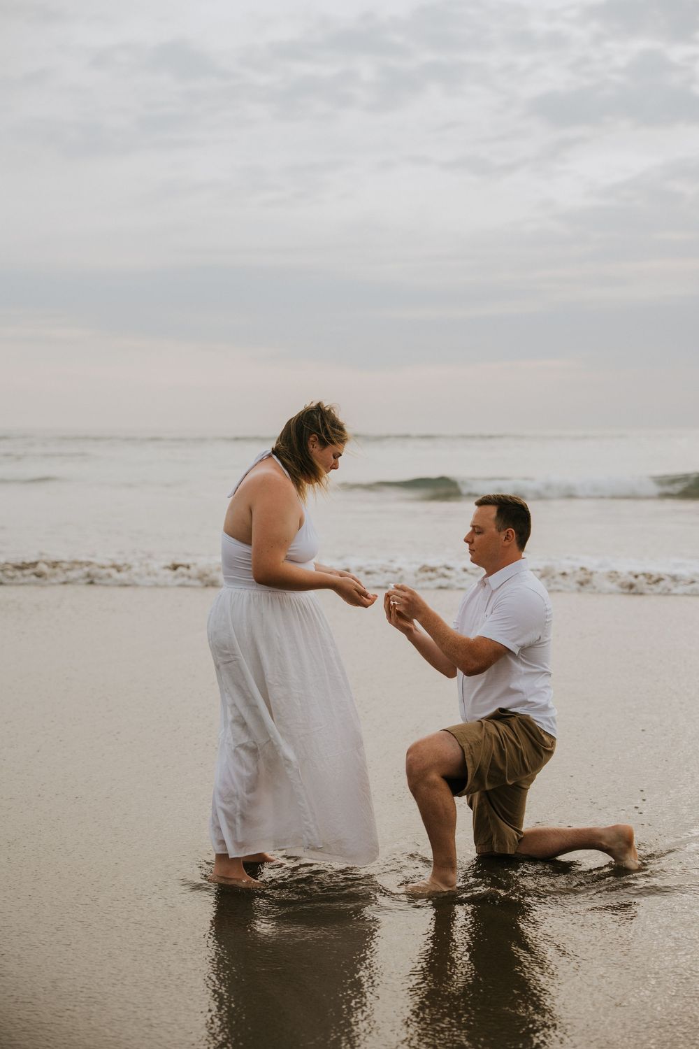 Surprise proposal photography at Petitenget Beach.
