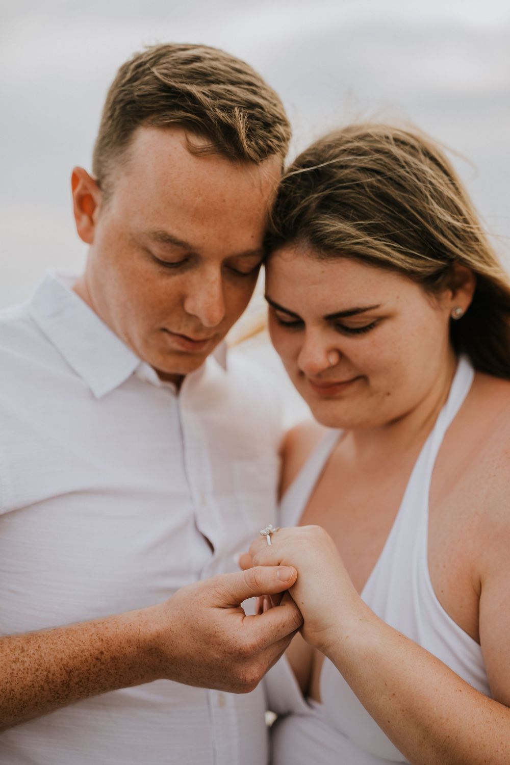 Surprise proposal photography at Petitenget Beach.