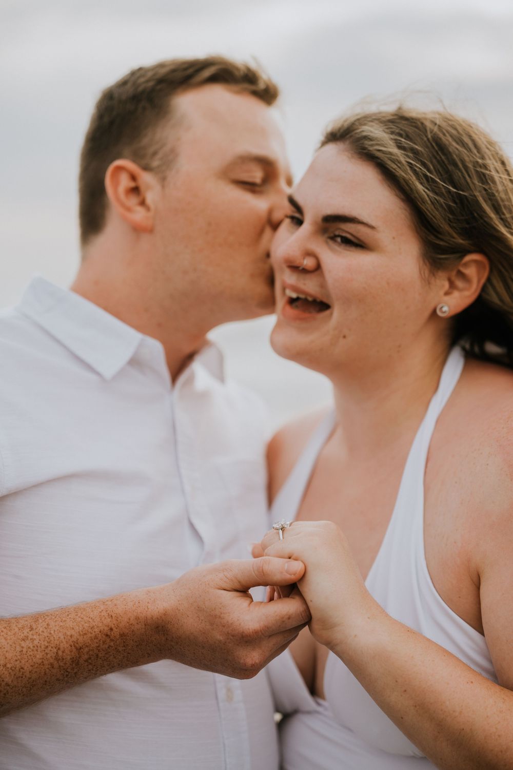 Surprise proposal photography at Petitenget Beach.