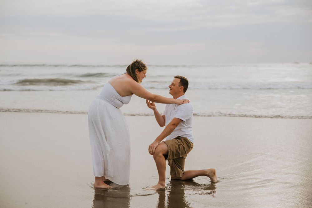 Surprise proposal photography at Petitenget Beach.