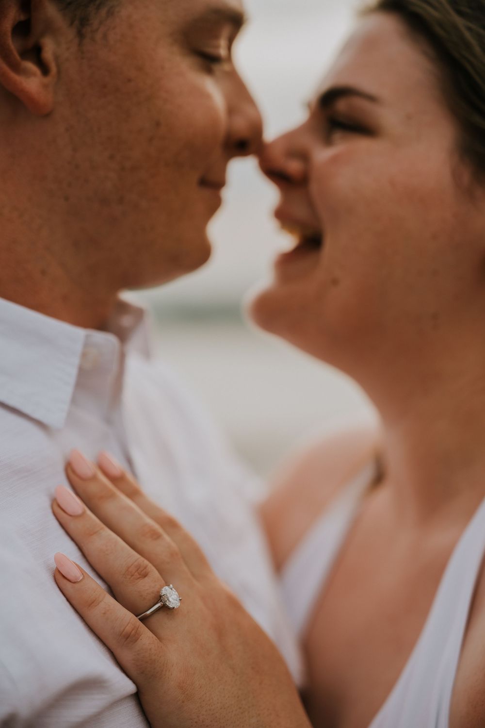 Professional surprise proposal photography at Petitenget Beach.