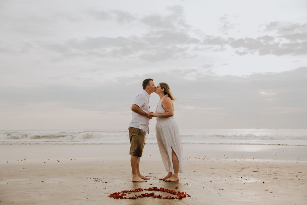 Professional surprise proposal photography at Petitenget Beach.