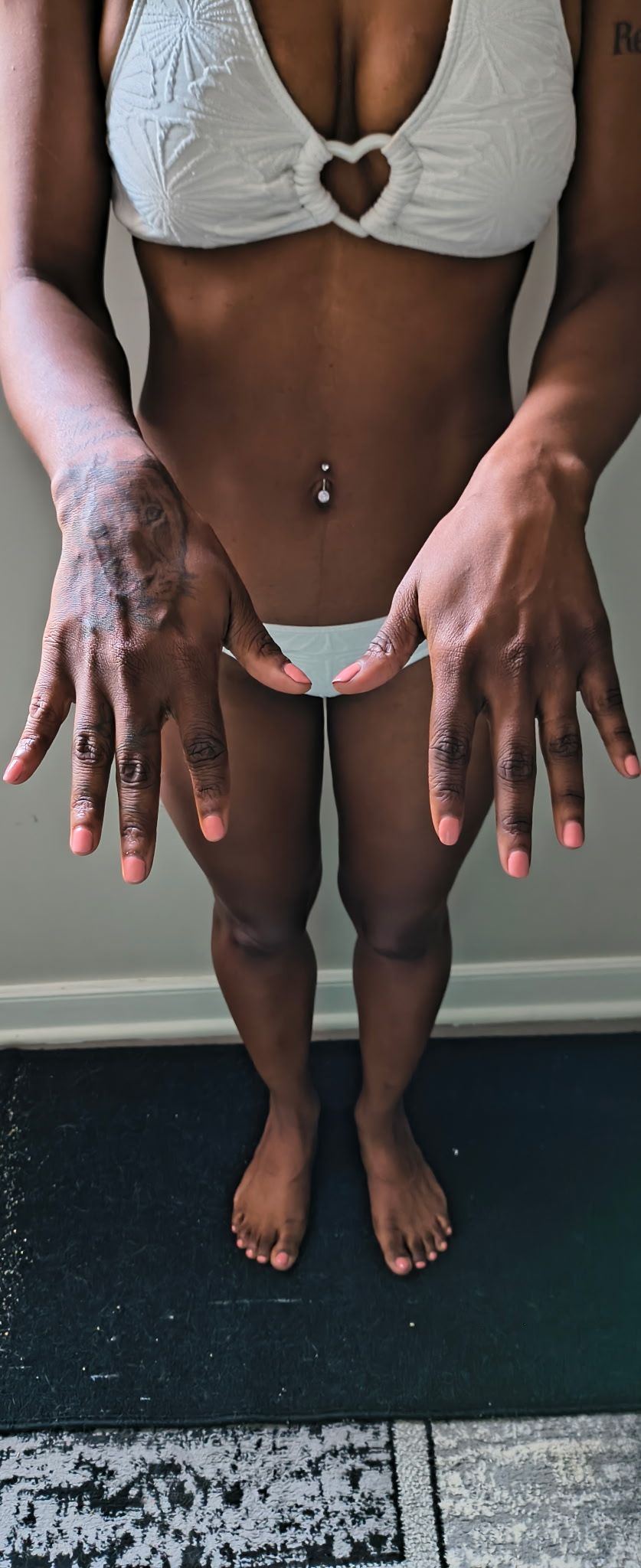 Front view of Genesis Dudley's hands for part modeling.