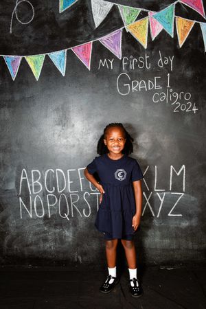 Caligro learner posing for their annual school portrait.