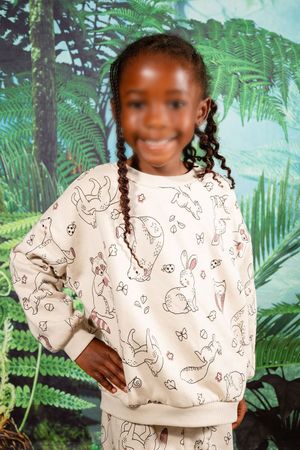 A beautiful picture of a pre-primary school child, smiling at the camera for their preschool portrait by Rynali Photography.