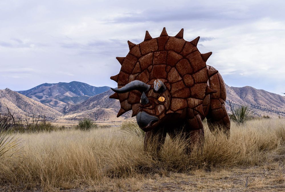 metal dinosaur statue