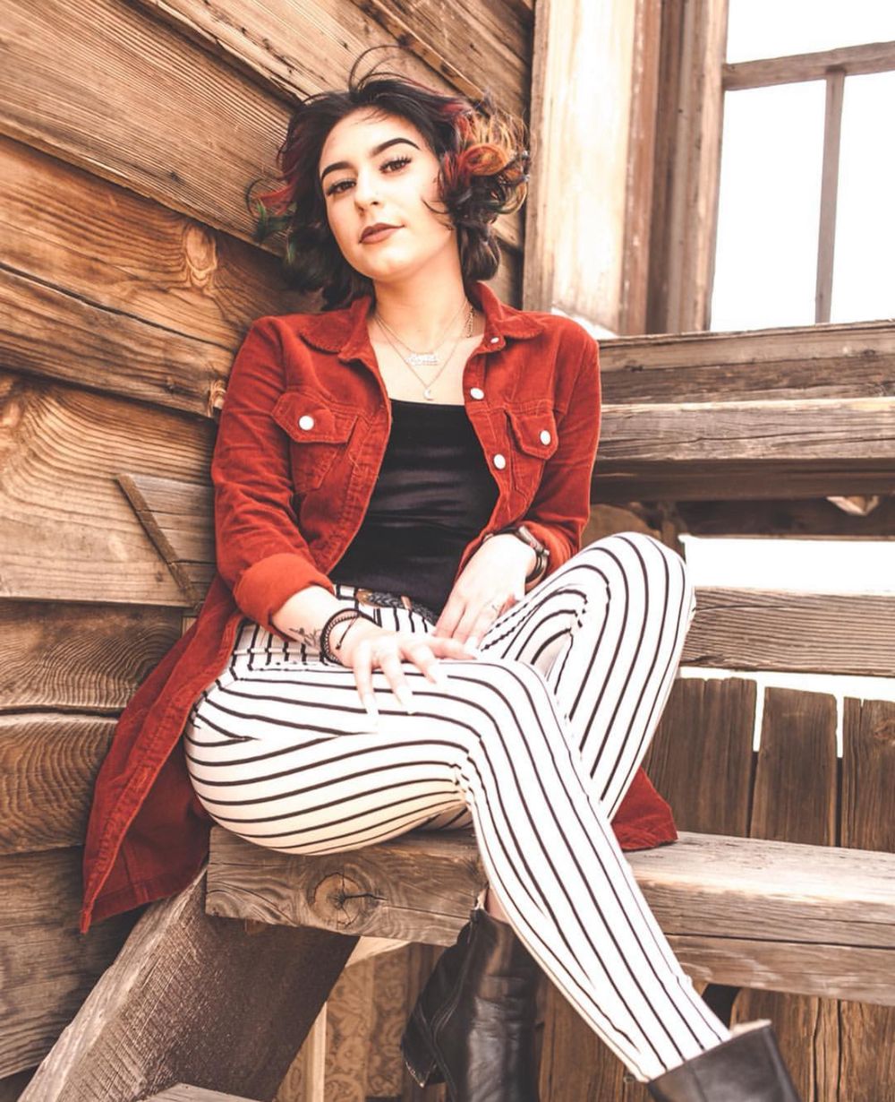 editorial senior portrait red jacket, Palm Springs senior photographer, pioneertown