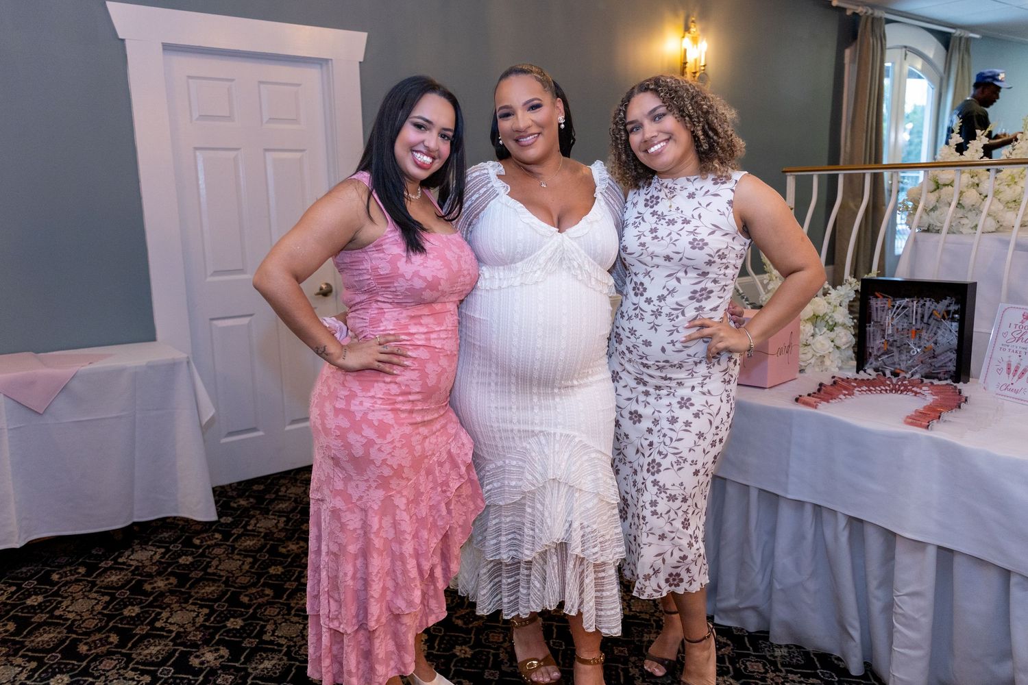 Mom-to-be posing with two friends at her baby shower, New Jersey baby shower photographer