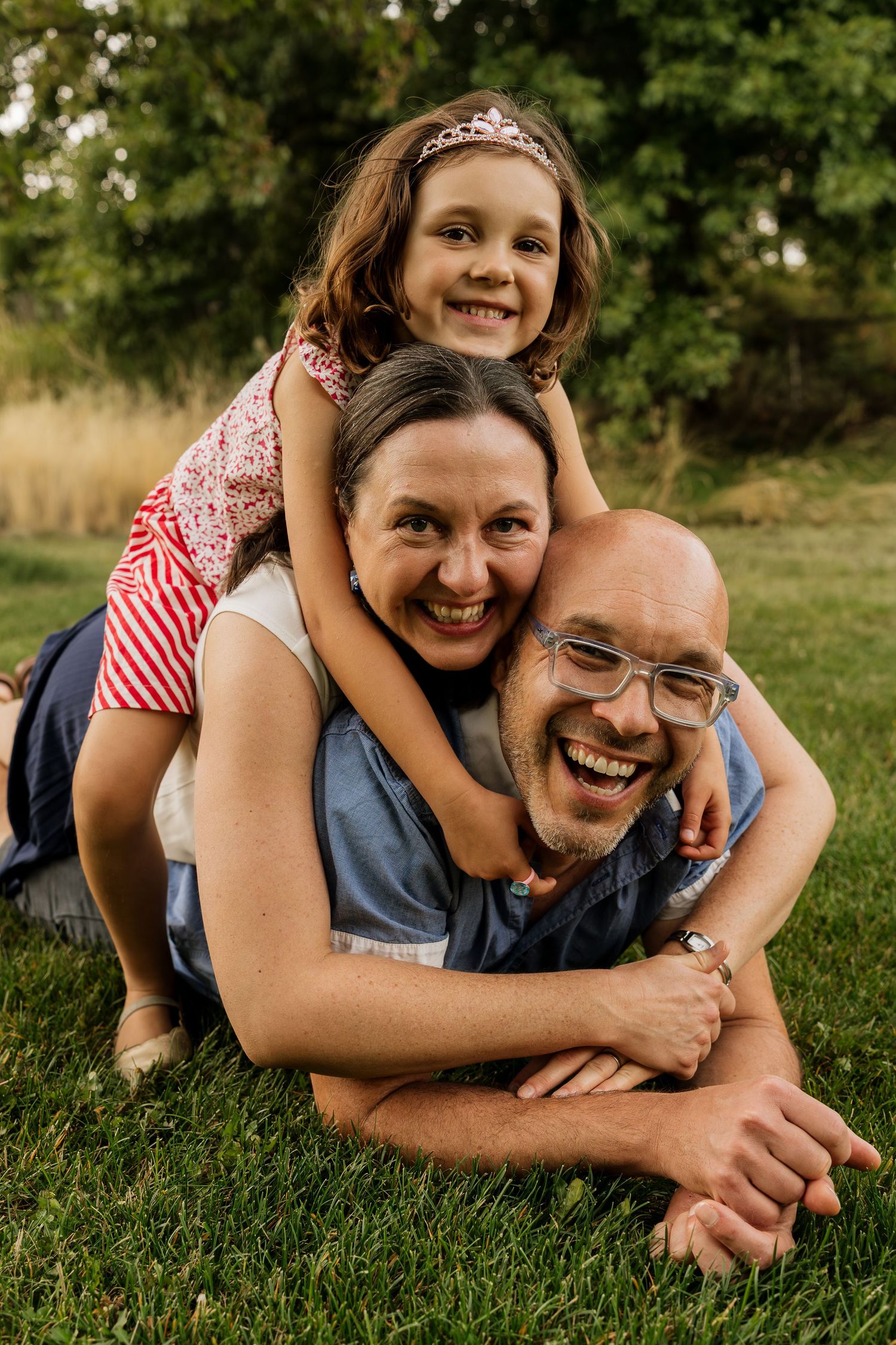 Playful family moment during an outdoor photography session