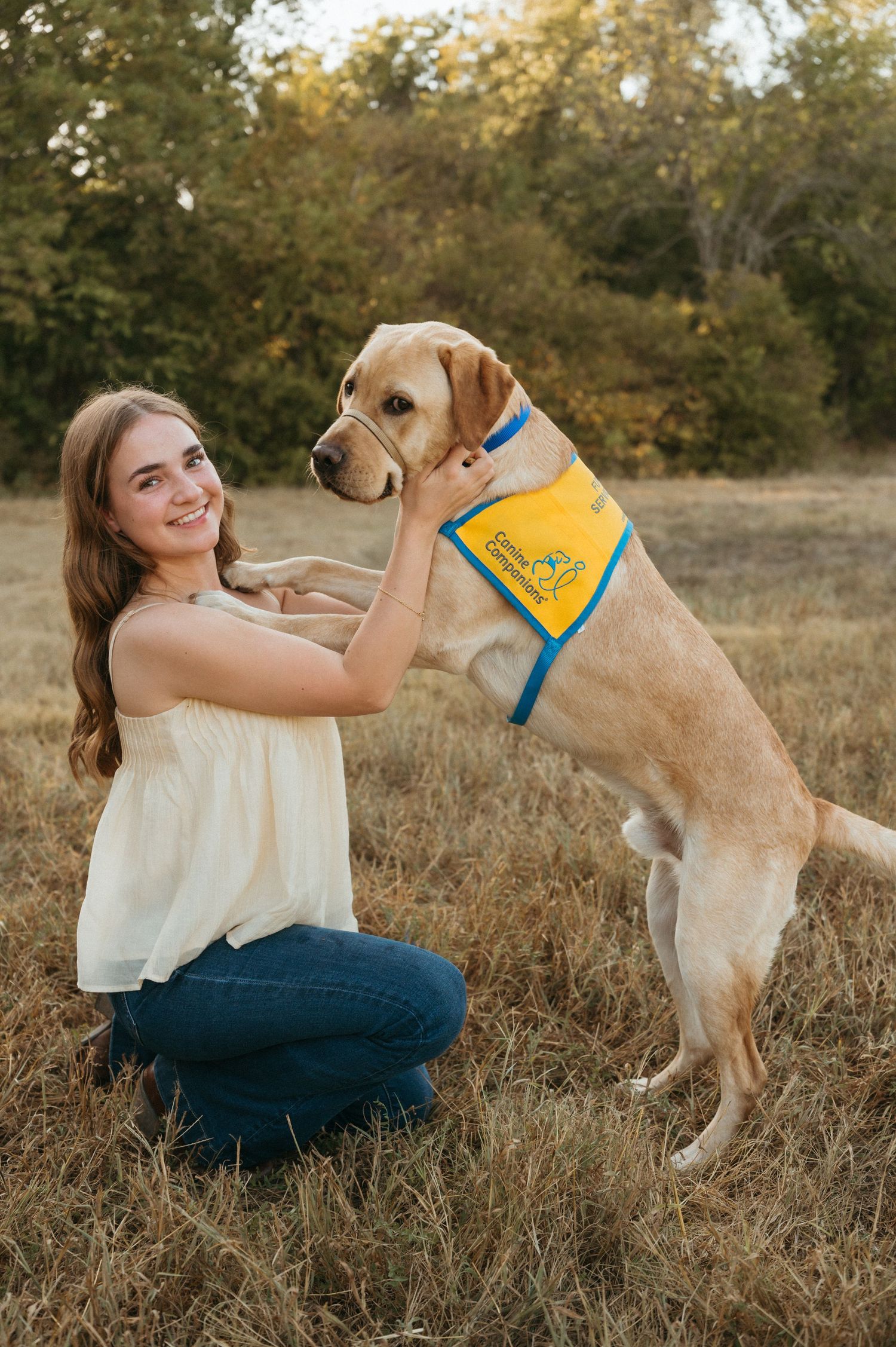 Allen senior portrait with FFA student and service dog in training at Oak Point Nature Preserve