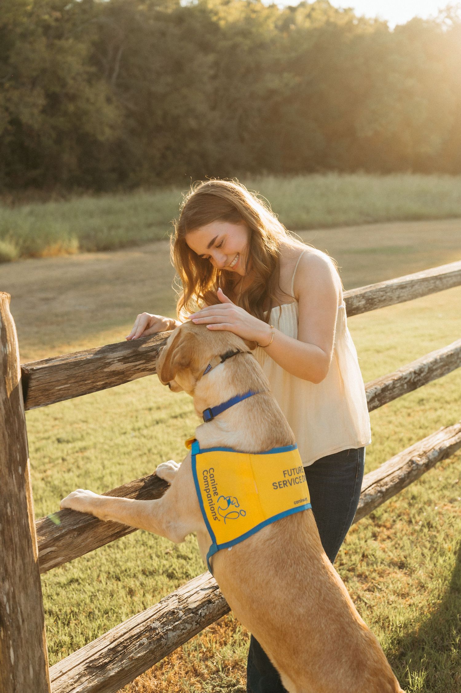 Allen Texas senior pictures featuring a meaningful high school activity and Canine Companion