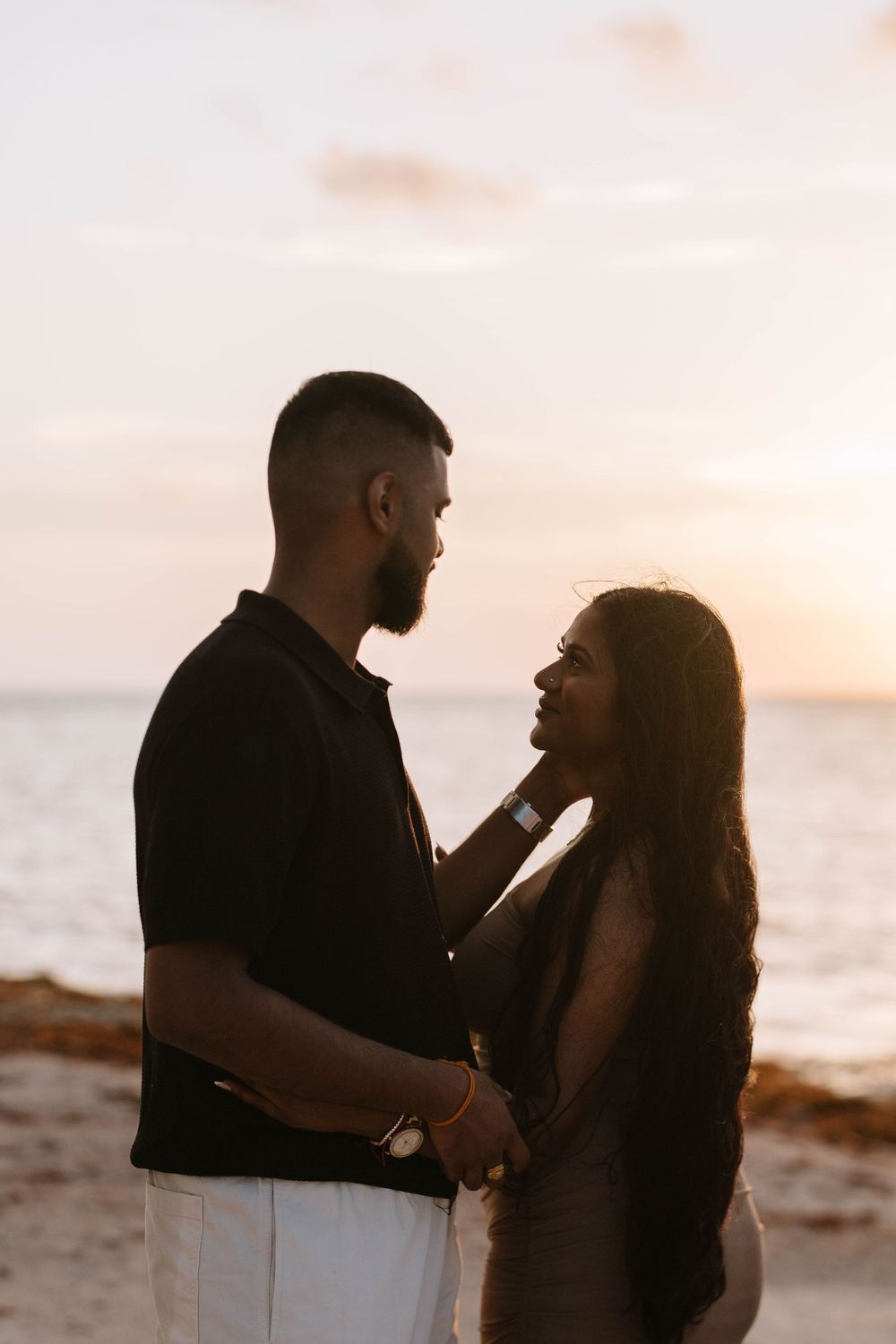 Couple engagement photography in Punta Cana with ocean views and natural light. Authentic moments that reflect your unique bond.