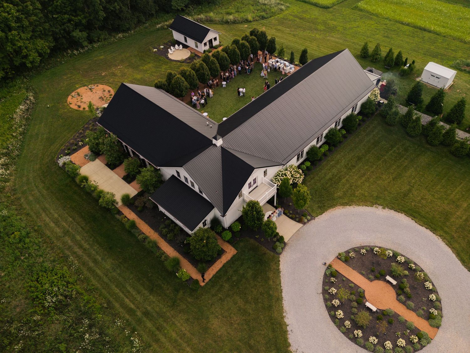 Aerial view of a white farmhouse at Magnolia Hill Farm, Ohio