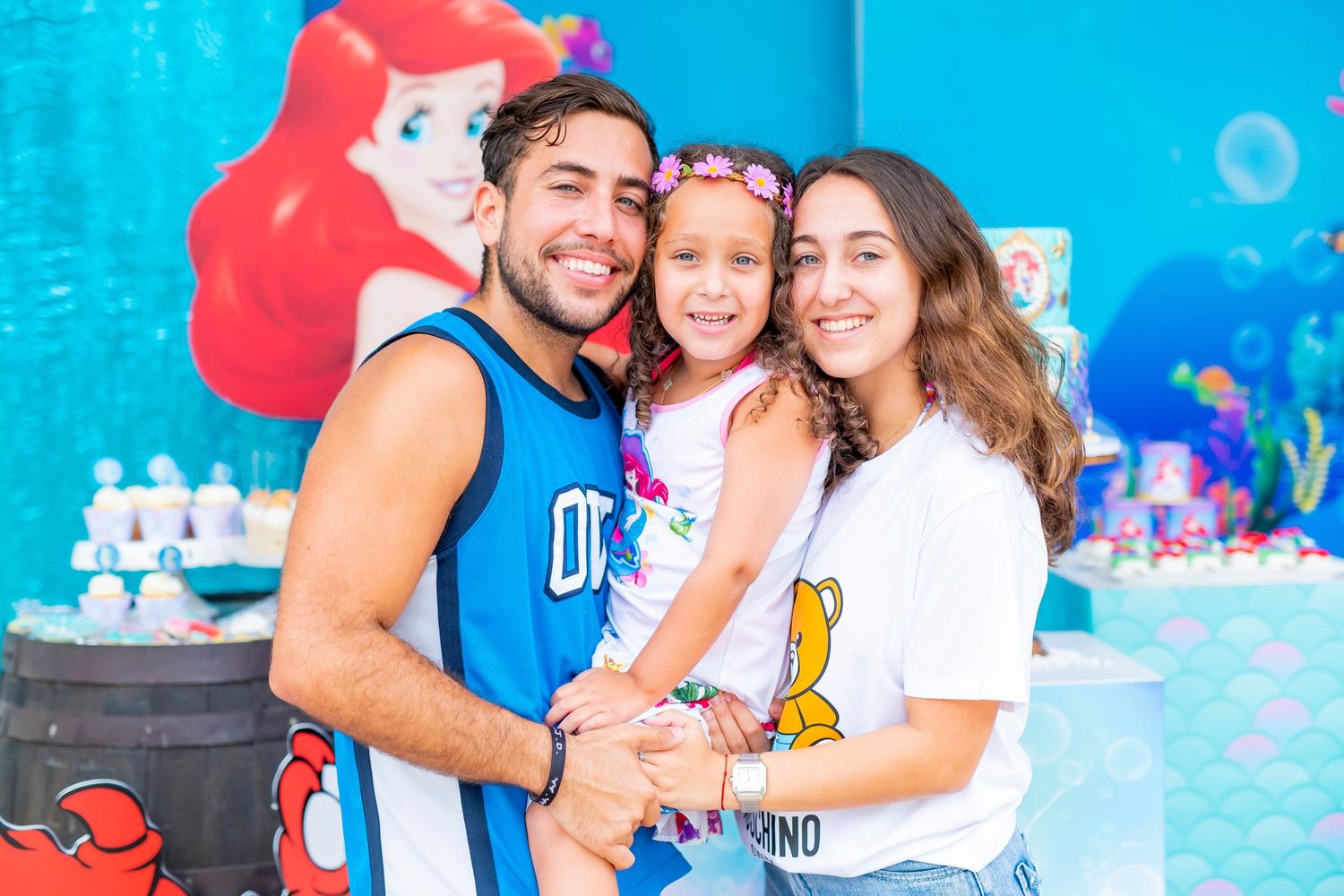 A themed party setting with underwater decorations and blue background.