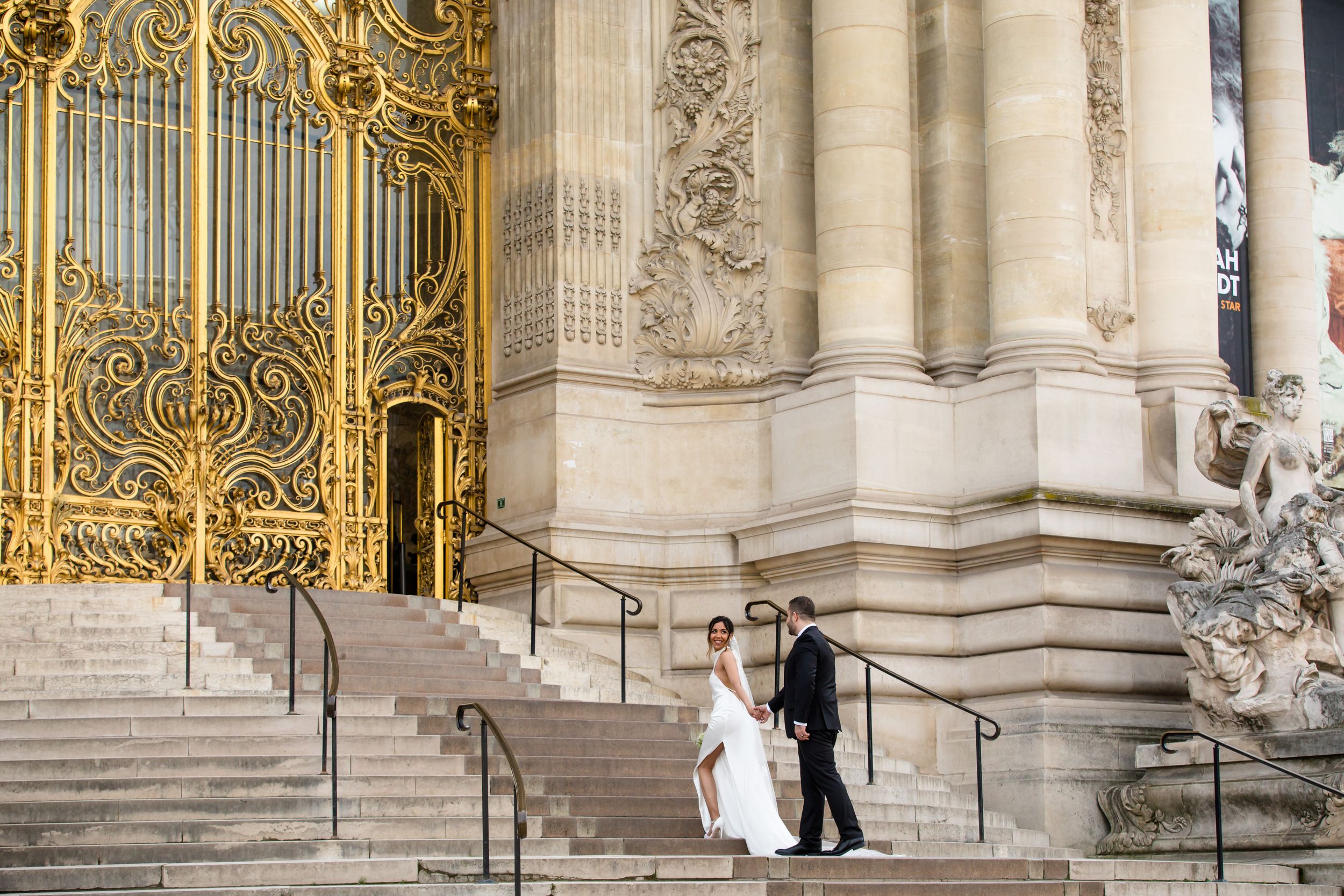 very elegant bride and groom walking the steps of the Petit Palais in Paris, Photo by Julien Photography Paris