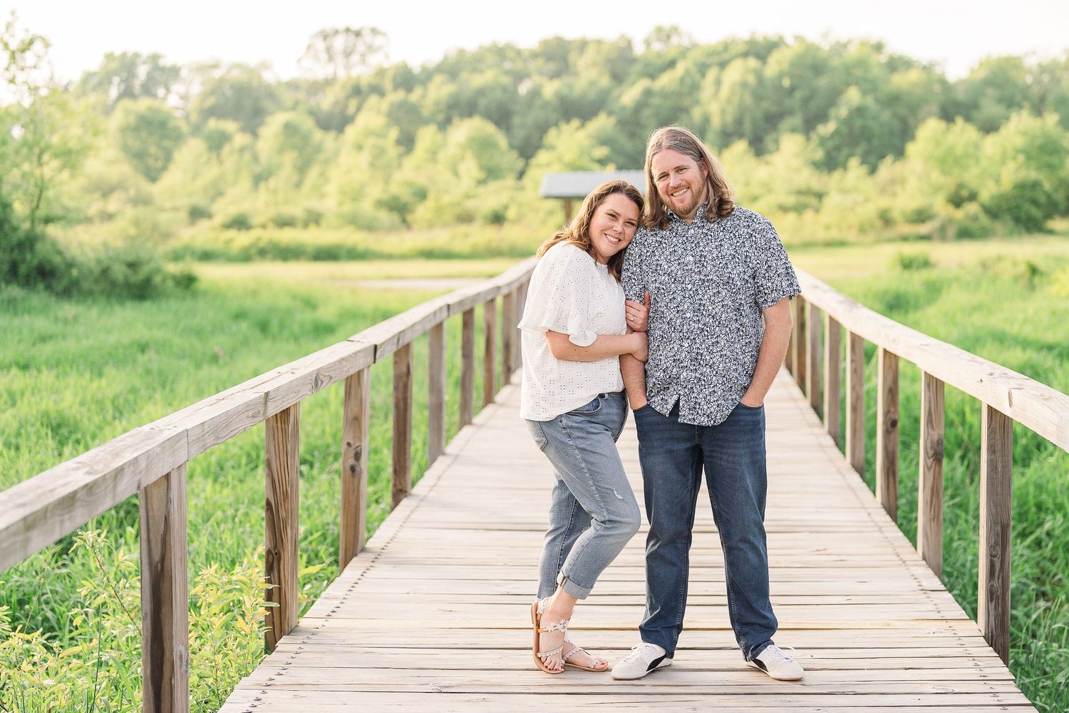 Engaged couple posing during their Kenosha engagement session.