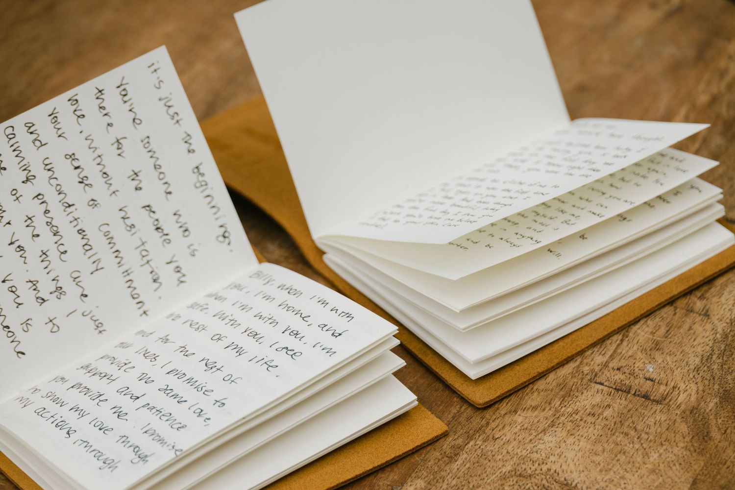 Handwritten vow books taken by vintage wedding photographers Clearwater Popping Champaign Photography