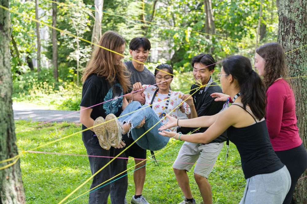 Students playing a team building game.