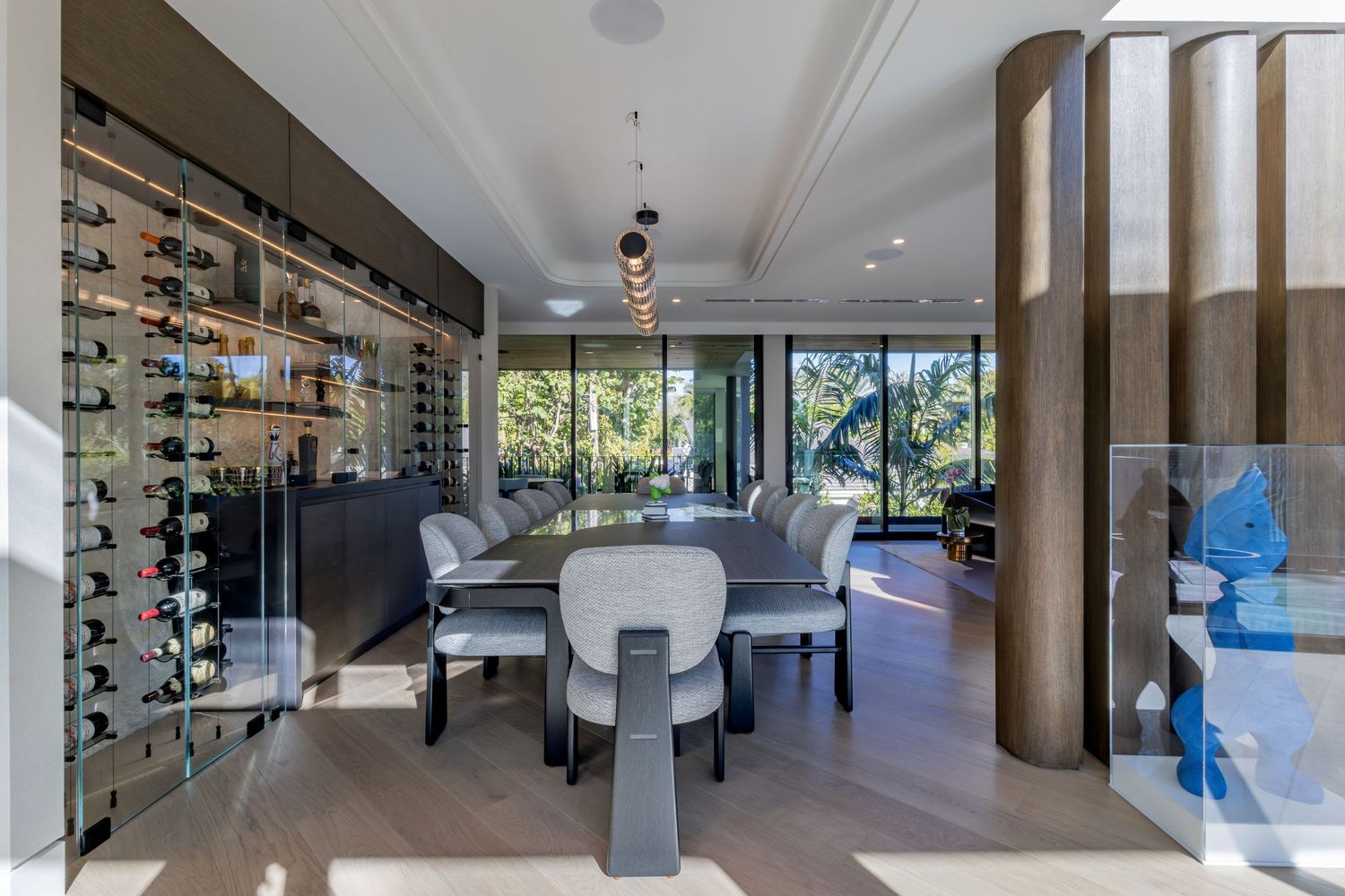 Spacious interior gallery space with wood accents and contemporary lighting design.