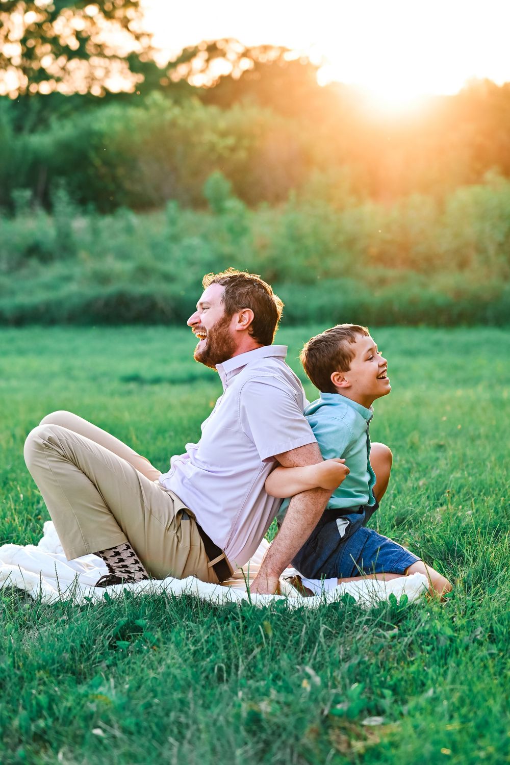 Father & Son laughing at McCallister Park in Lafayette, Indiana.