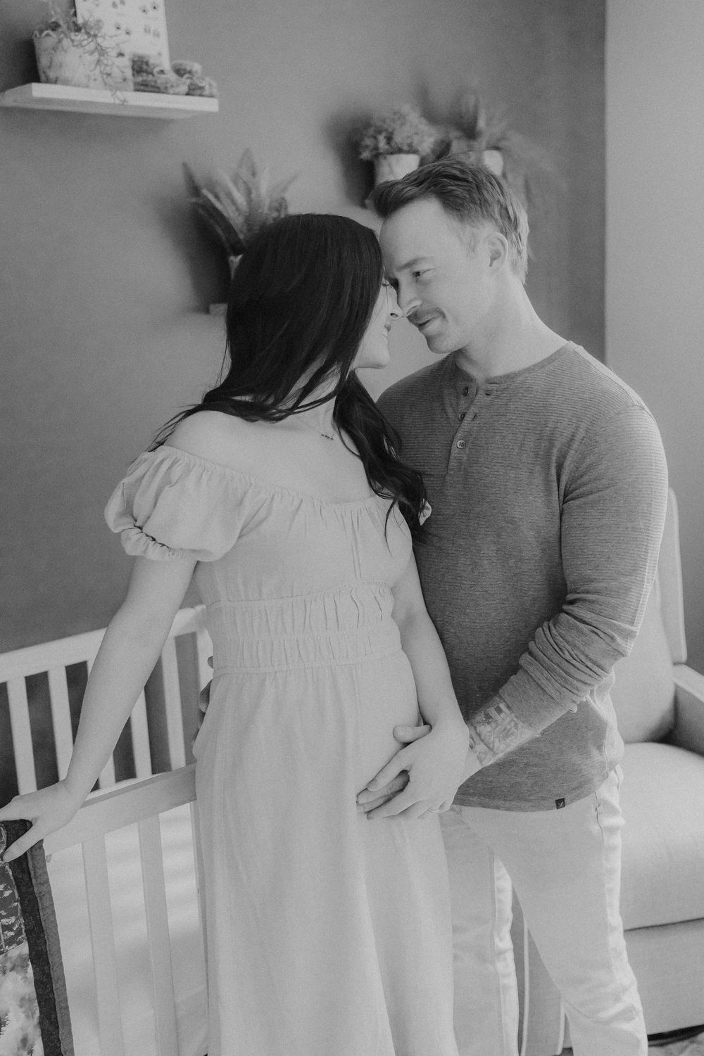 Black and white photo series of couple sharing intimate moments.