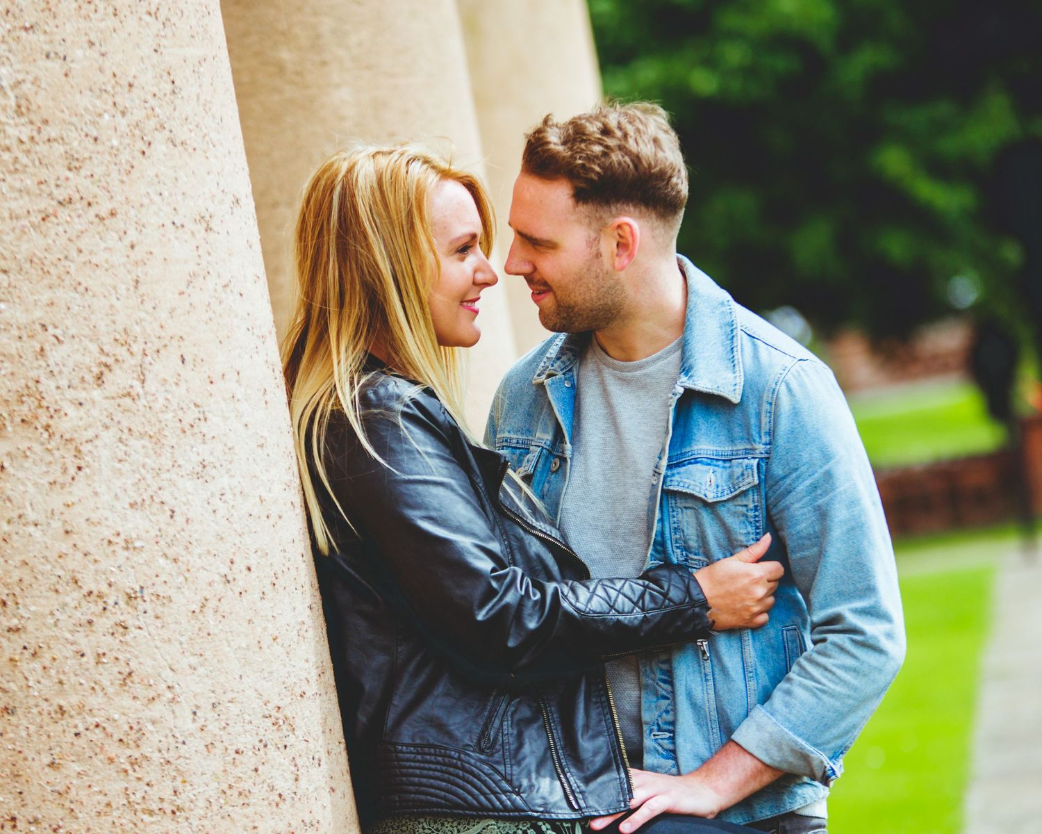 a couple on their engagement session smiling and laughing at Himley Hall where the session was hosted