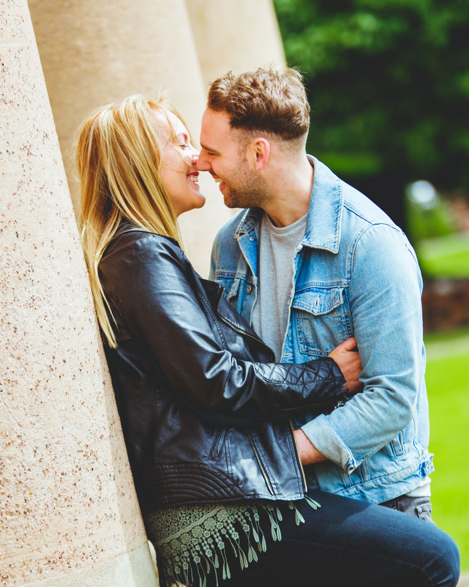a couple on their engagement session smiling and laughing at Himley Hall where the session was hosted