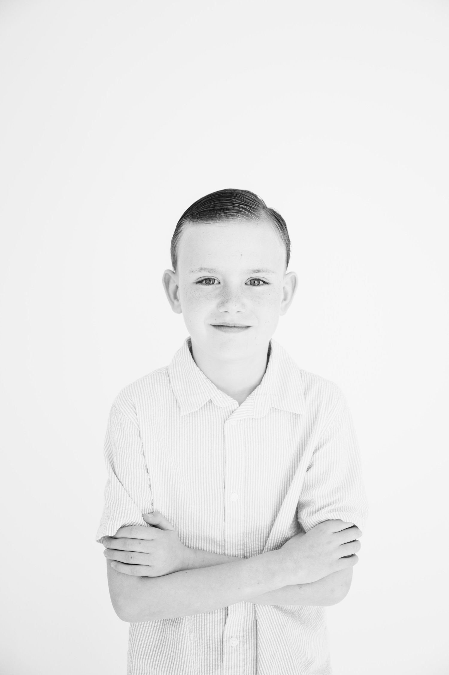 Black and white portrait against white background.