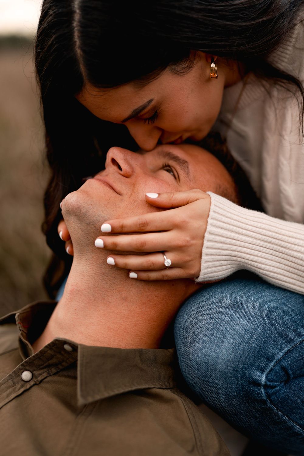 A series of six intimate photos showing connected hands and close physical contact against a moody background.