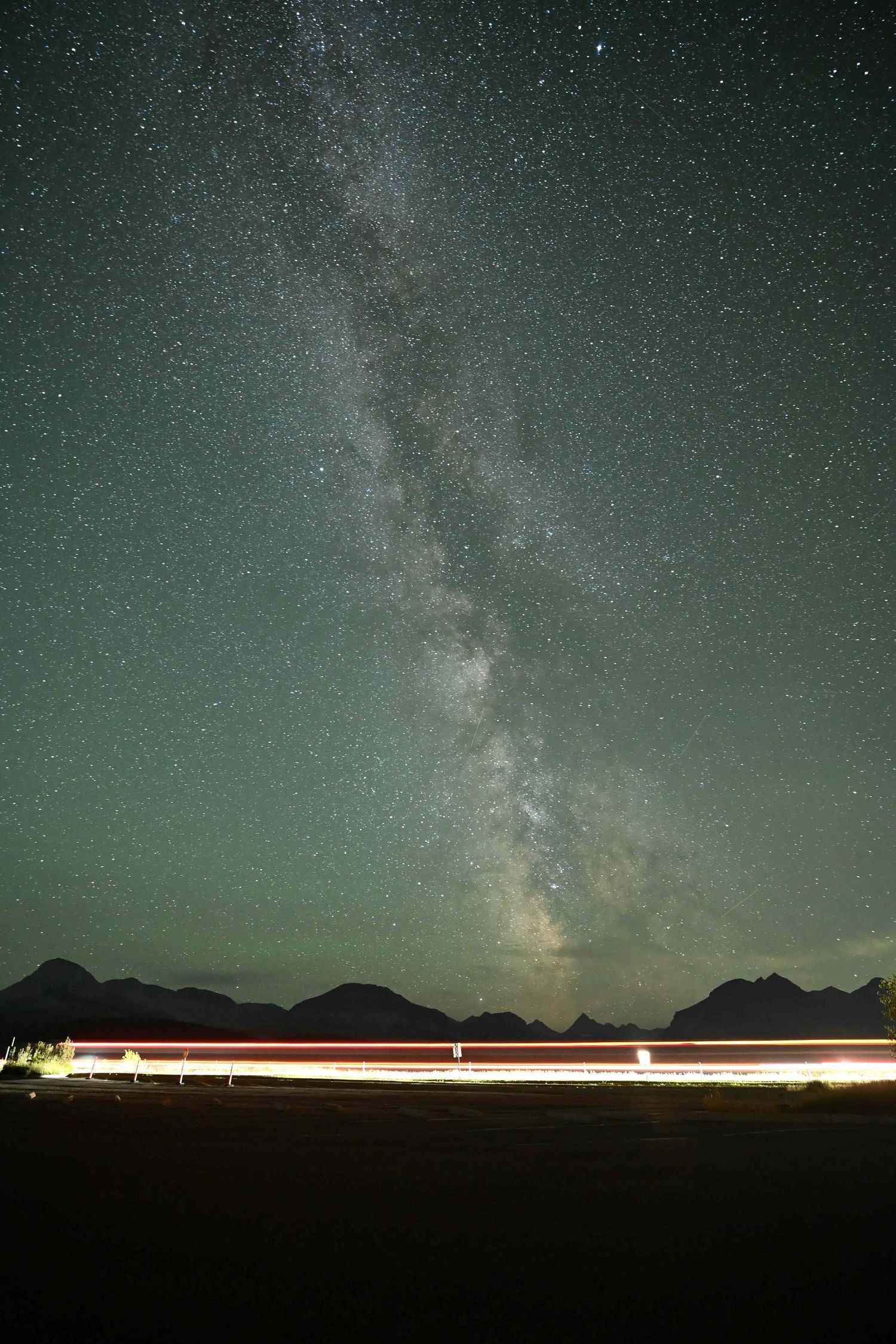 Milky Way at night, outside of the Visitor Center at Glacier National Park in Montana. Big sky country.