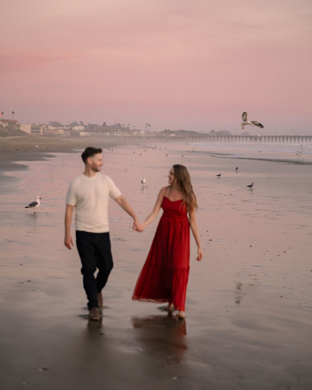 Romantic and Fun Engagement Photos in Golden Hour light in Pismo Beach, California, from an Arroyo Grande Wedding Photographer.