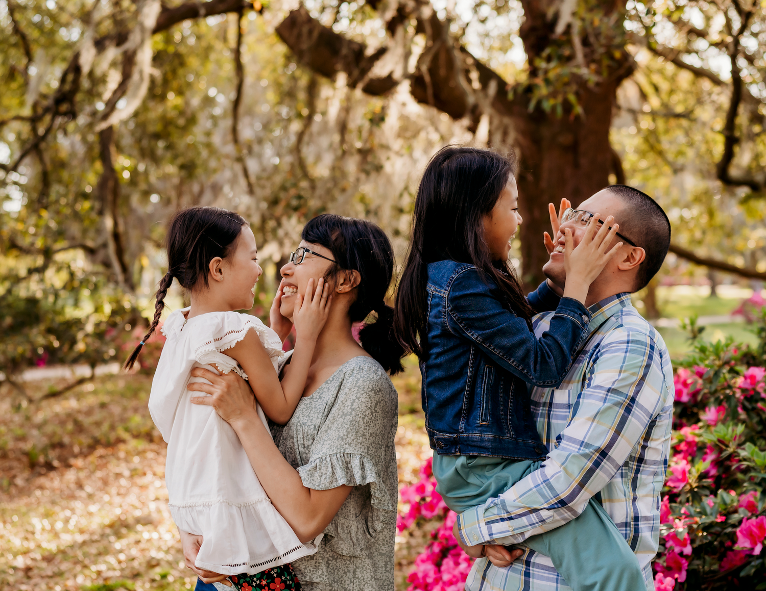 Photographers own family photos in Charleston, South Carolina.