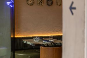 Architectural detail showing modern indirect lighting design along a wall cove creates subtle ambient illumination.