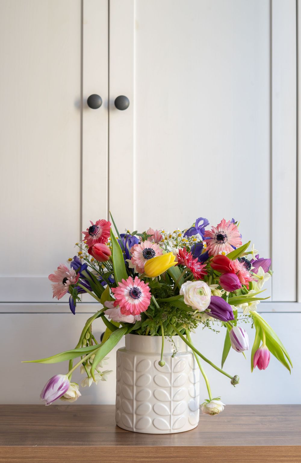 Spring flowers arranged in a vase