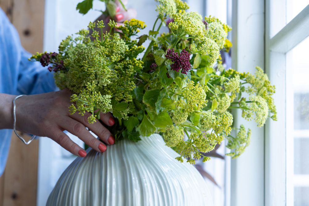 Flower arranging in a stylish vase photographed by BLOOM Fabulous Photography