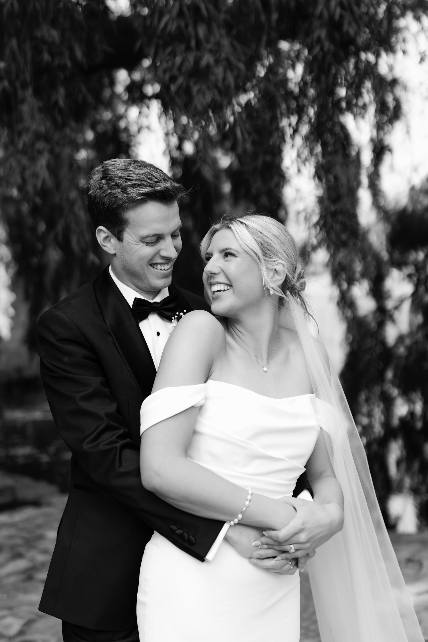 Newlyweds sharing private vows during a romantic Adelaide wedding moment, capturing an intimate and emotional connection