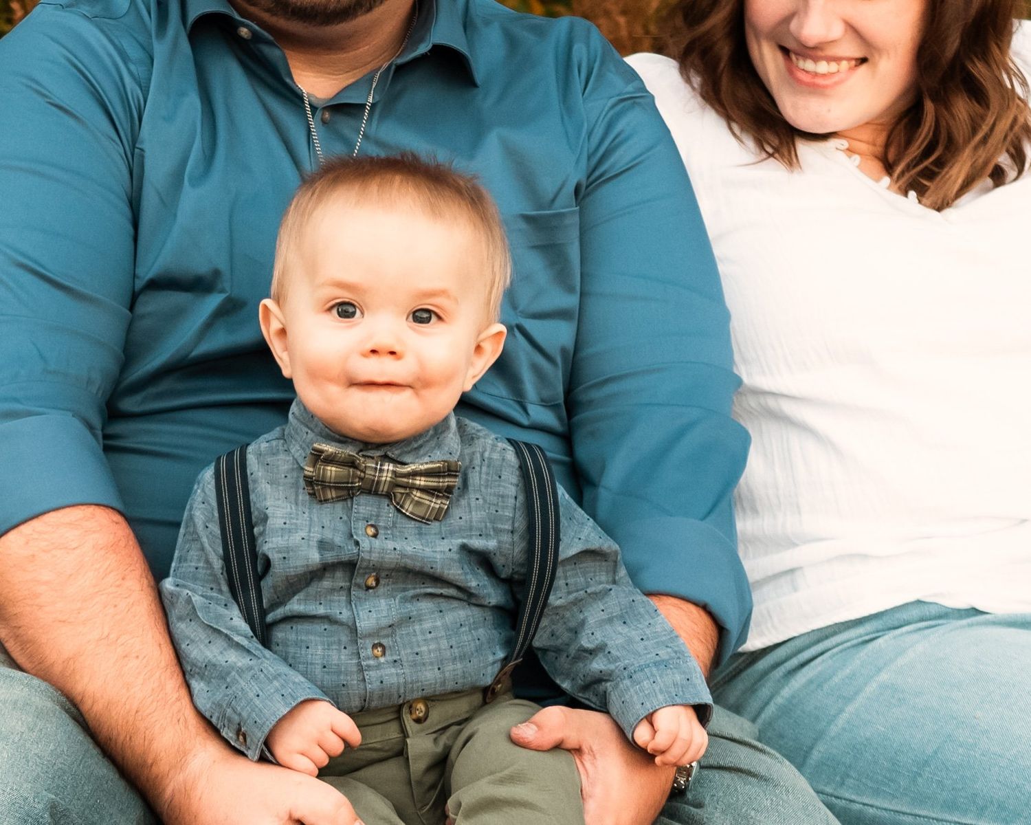 Casual family portrait series with teal and white clothing against light background.