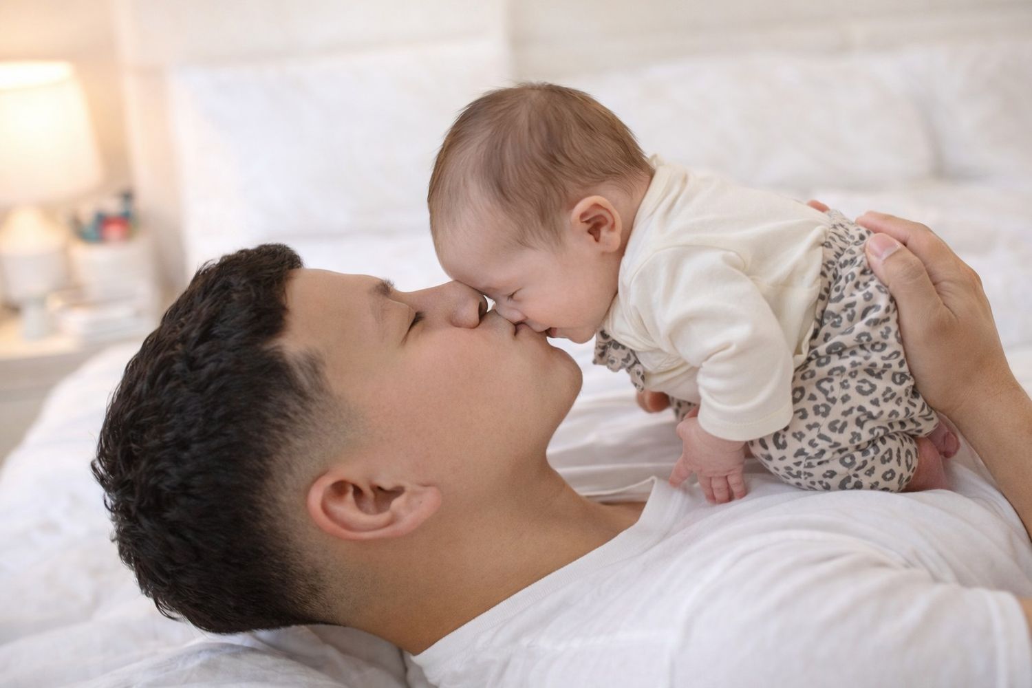 A heartwarming series of photos showing tender moments between a parent and baby during playtime.